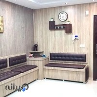 Dr. Hassanali Metant