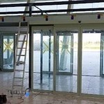 ایمن درب اتوماتیک شیشه ای کرکره برقی سکشنال جک پارکینگی