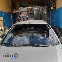 شیشه اتومبیل علی زحمتکش