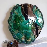 طراحی وساخت ساعت دیواری وظروف رزینی وهفتسین
