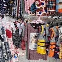 پارچه فروشی و لباس زنانه بچگانه
