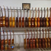 تولید ادوات موسیقی متاع پور | تولید گیتار ، عود و دف