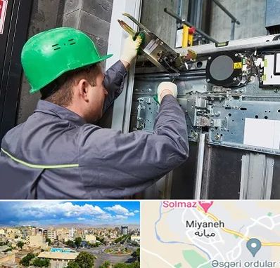 سرویس کار آسانسور در میانه